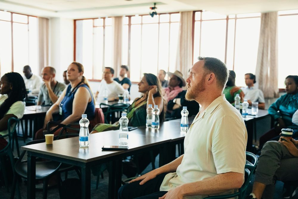 Audience at an in-person conference. Photo: Dwayne joe / Unsplash