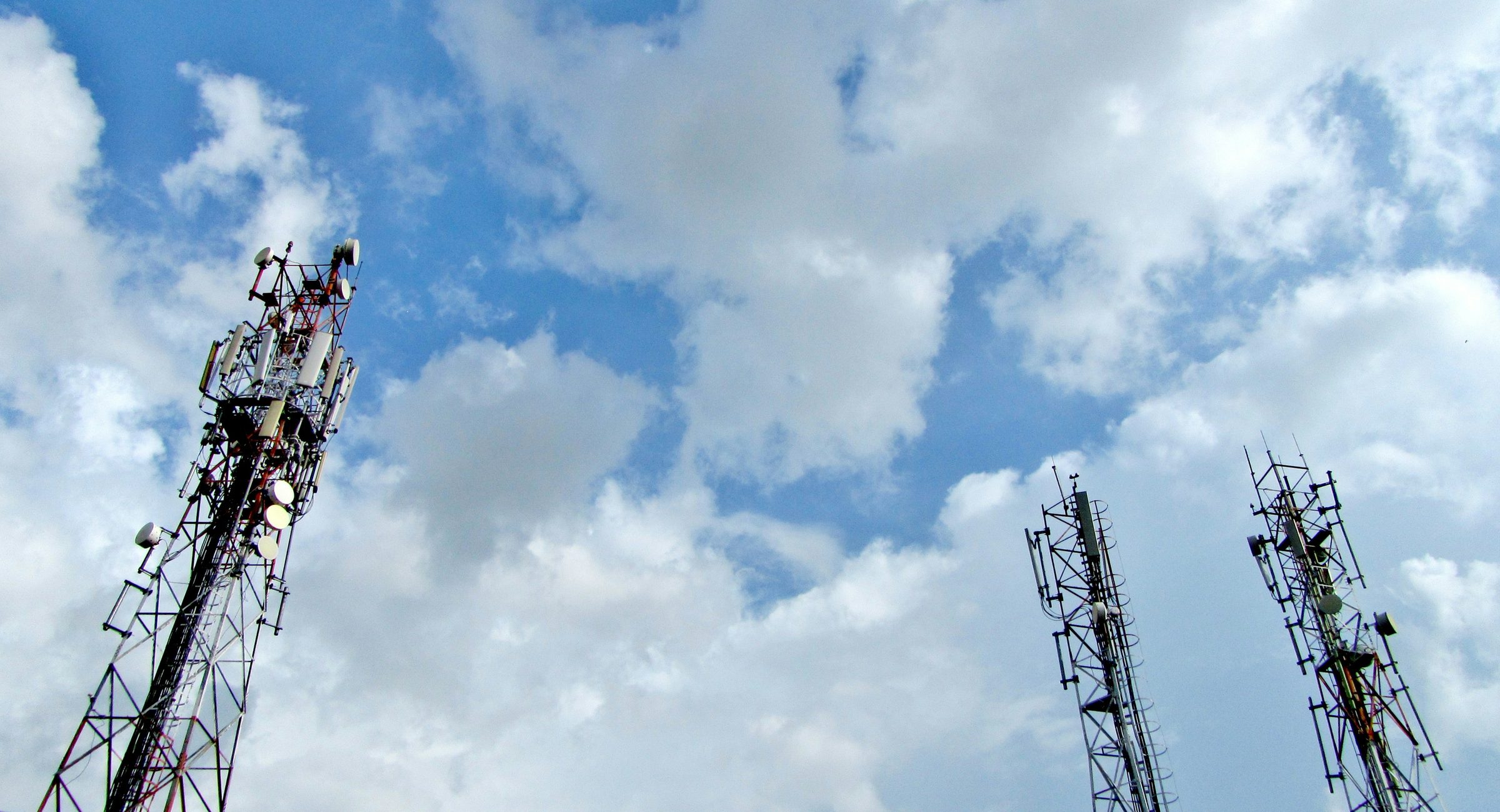 Cell towers under a cloudy sky, India. Photo: Mudit Agarwal / Unsplash